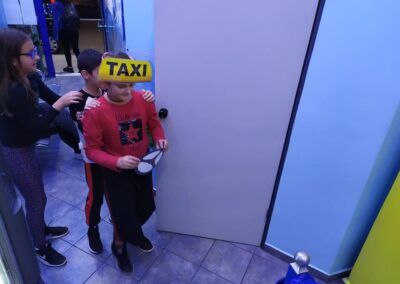 A CLASS: Giving directions to the taxi driver.