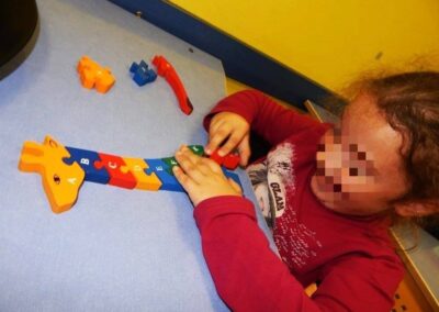 A JUNIOR: Learning the alphabet.